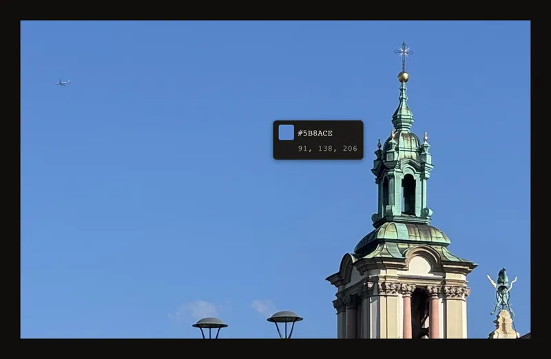 Floating colour preview with swatch, HEX and RGB values over the sky of the church photo